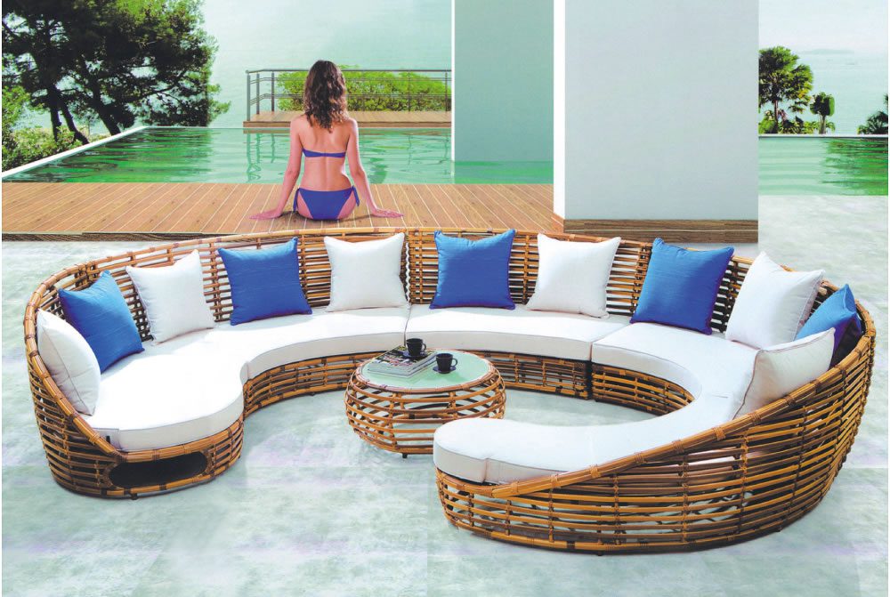 rattan-outdoor-sofa-curved-design-cushions-glass-table