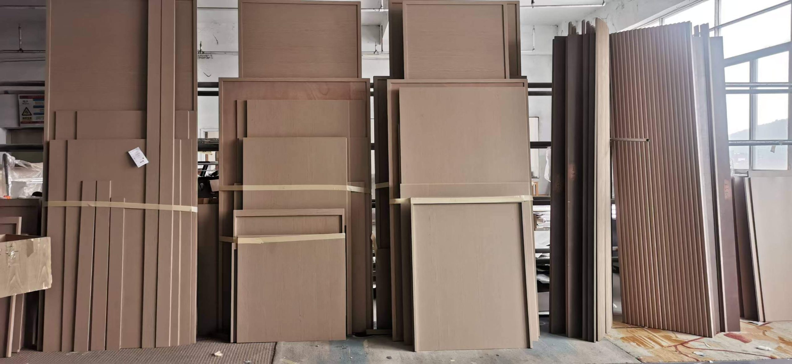 High-density engineered wood panels prepared for Marriott hotel room cabinetry