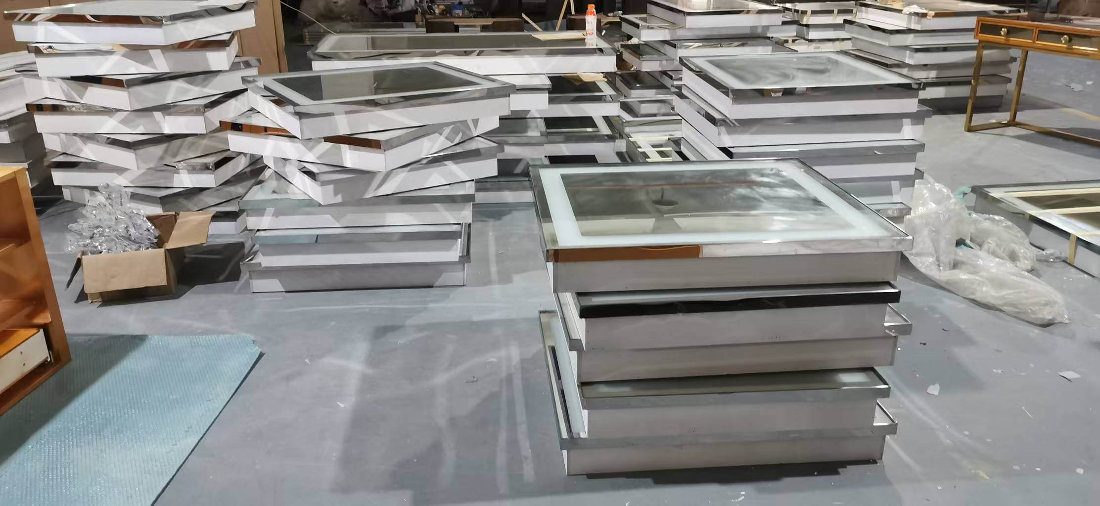 High-density engineered wood panels staged in our factory for Marriott hotel room cabinetry