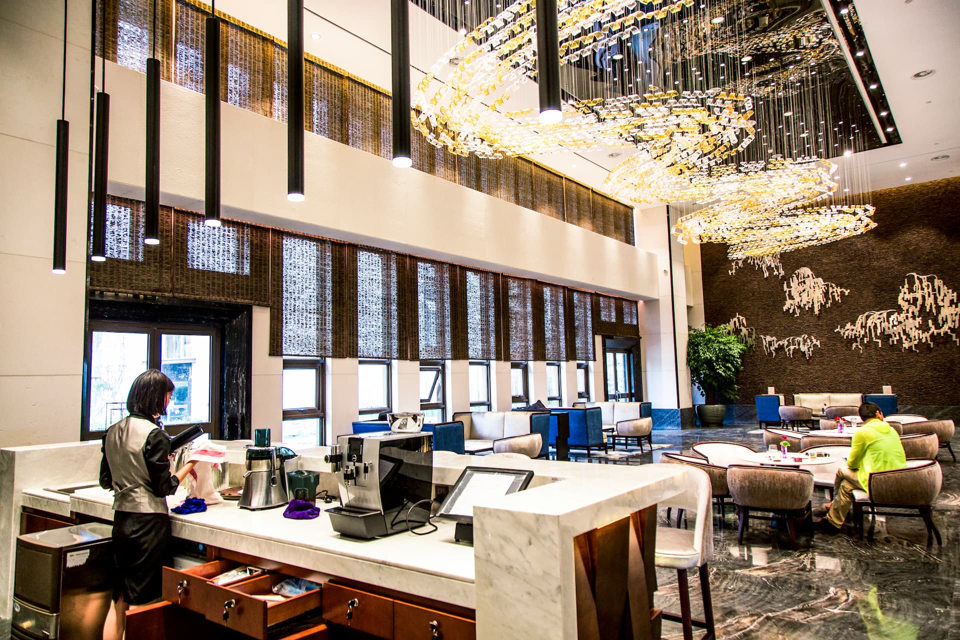 5 star hotel lobby luxury resort furniture featuring custom marble coffee tables and accent armchairs