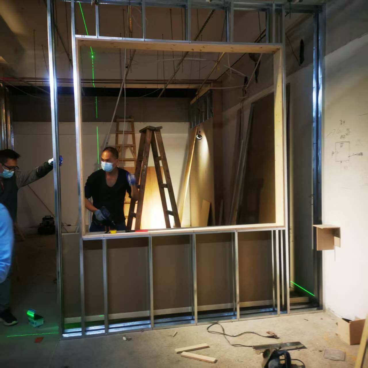 Professional hotel furniture installation team working in a luxury hotel room - CH Furniture