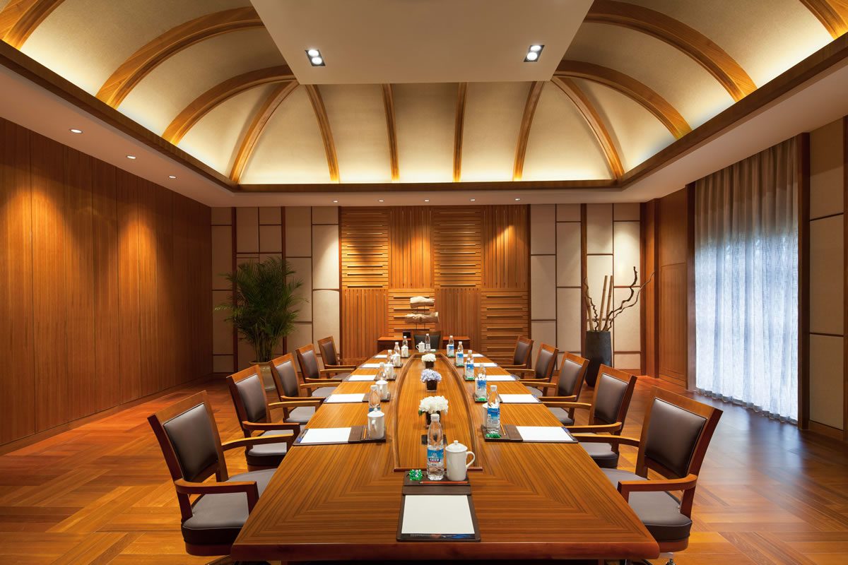 Detailed view of AV integration and joinery in custom conference room furniture